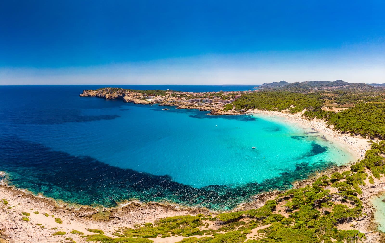 Cala Agulla – paradiesische Meeresbucht mit feinsandigem Strand
