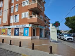 FARMACIA Juan Feliu Román logo