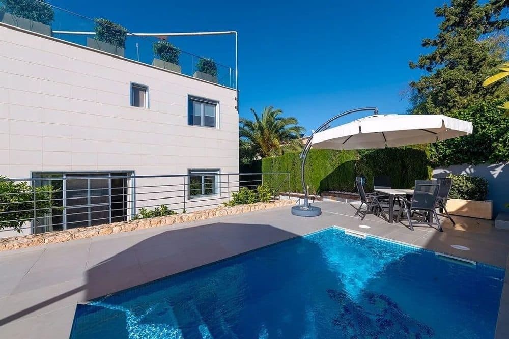 CALA BLAVA: CASA PAREADA CON VISTAS AL MAR Y PISCINA 4
